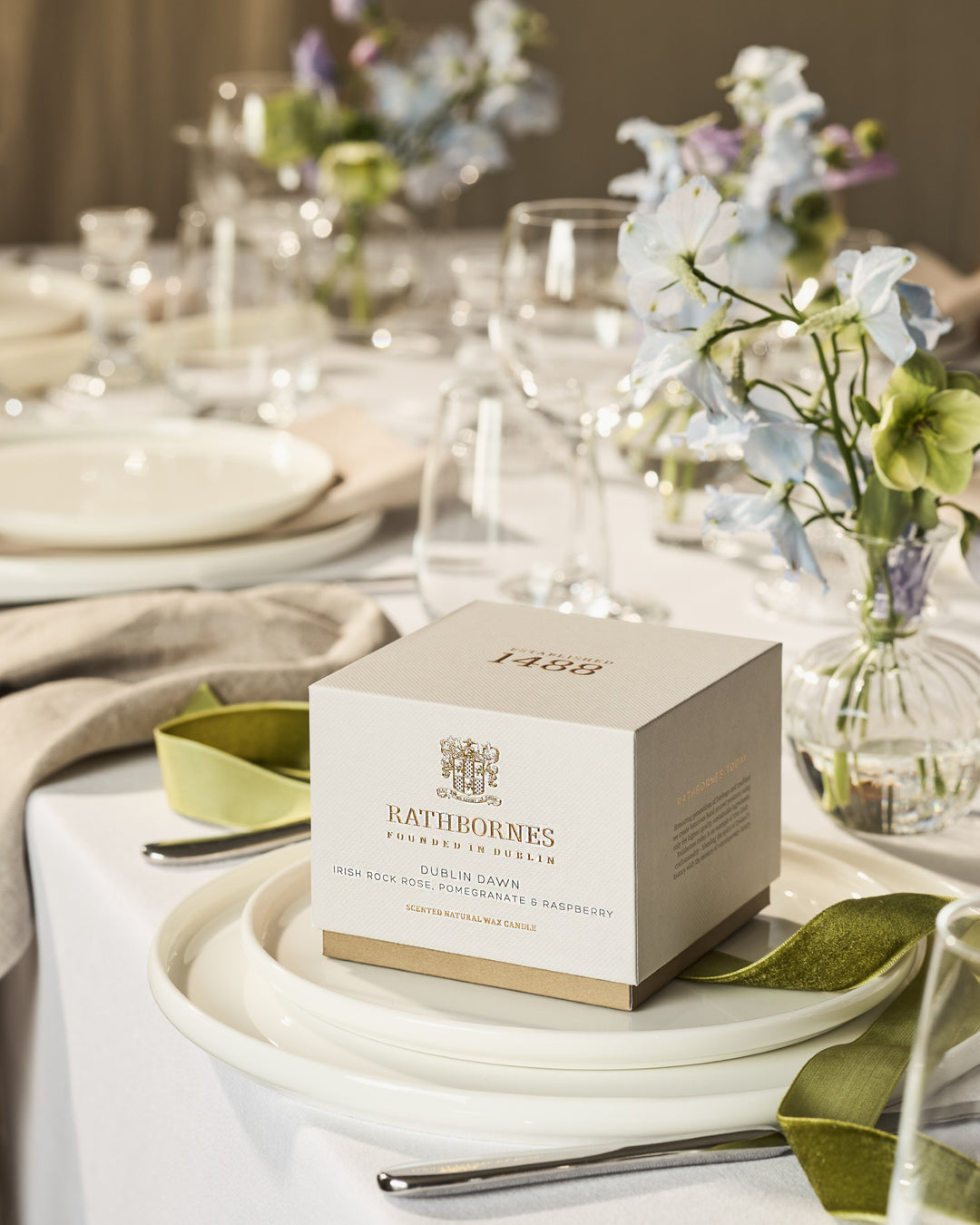 Candle box sitting on top of a wedding dining table with cutlery
