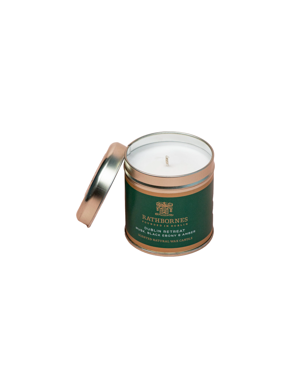 Dublin Retreat tin candle lid opened on a white background.