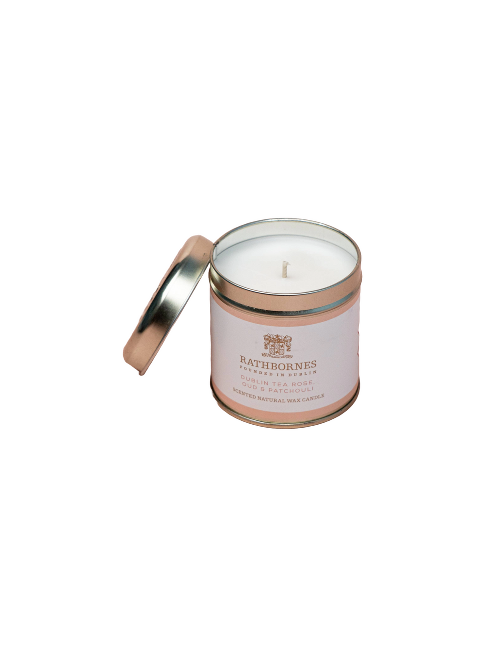 Dublin Tea Rose Tin Candle lid opened on a white background.