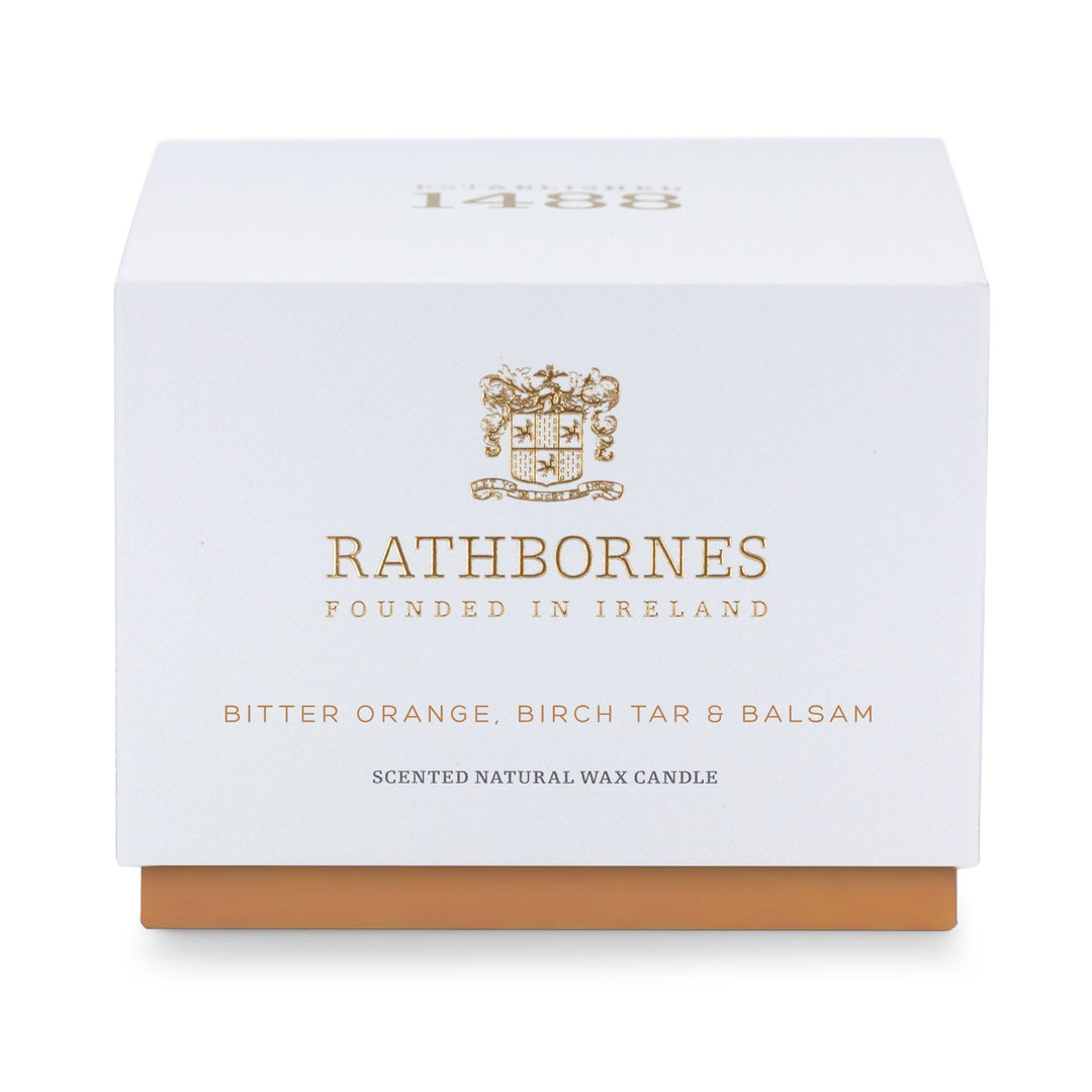 White gift box with amber base for the Rathbornes Bitter Orange, Birch Tar & Balsam classic scented candle
