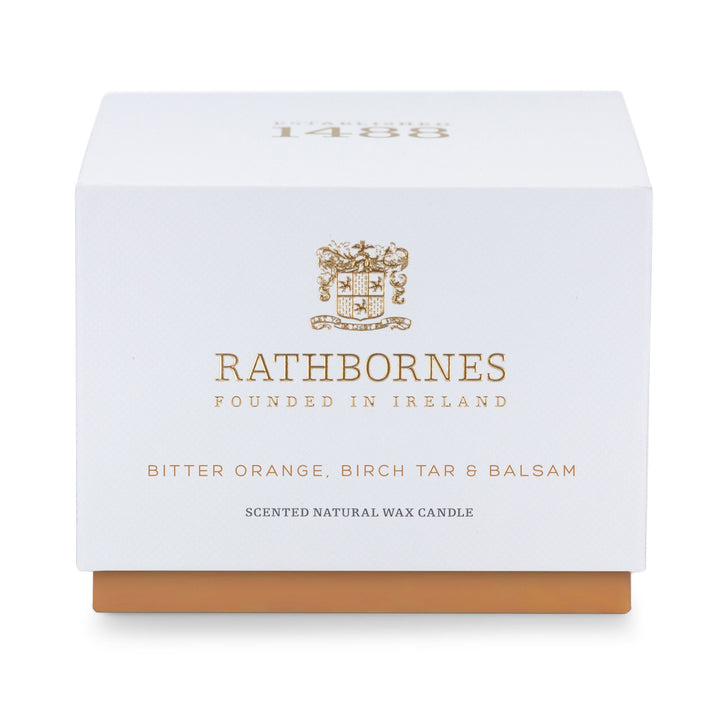 White gift box with amber base for the Rathbornes Bitter Orange, Birch Tar & Balsam classic scented candle