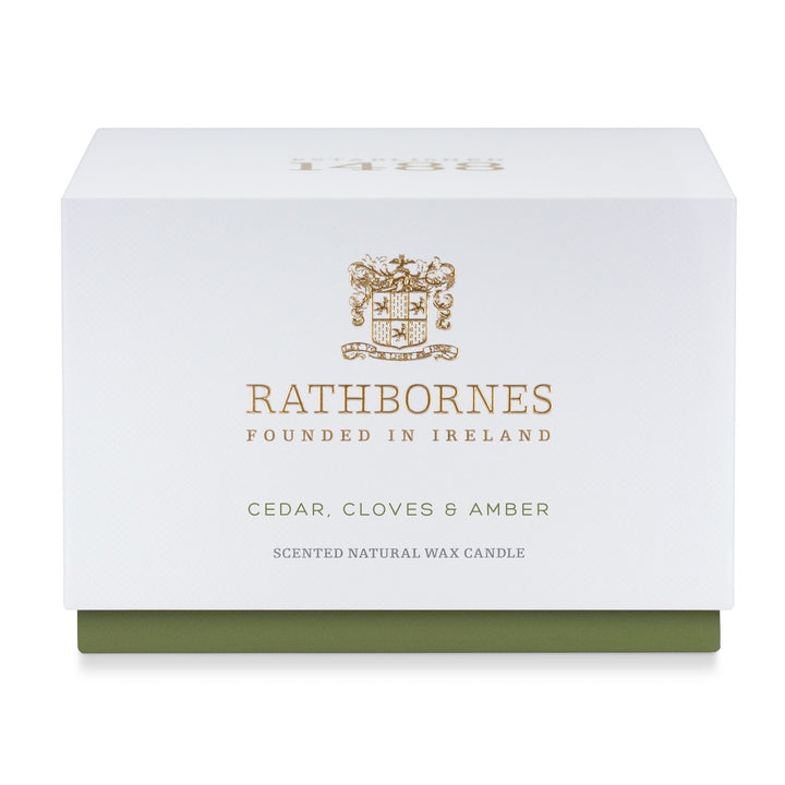 White gift box with green base for the Rathbornes Cedar, Cloves & Amber luxury scented candle