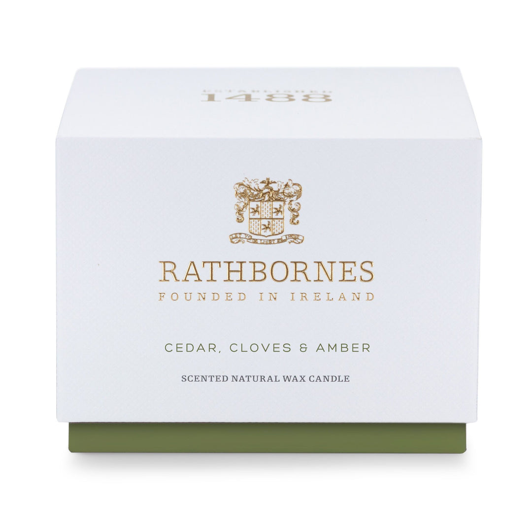 White gift box with green base for the Rathbornes Cedar, Cloves & Amber classic scented candle