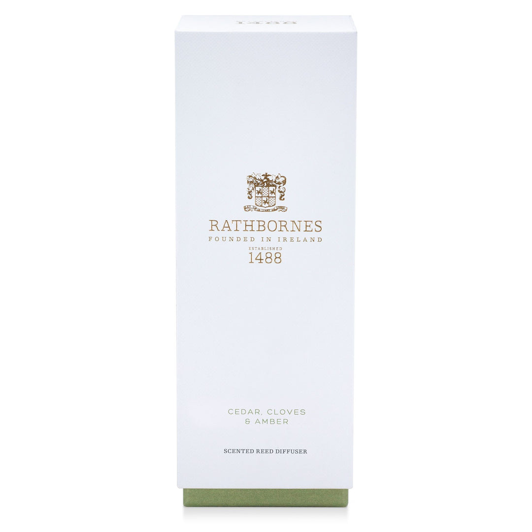 White gift box with green base for the Rathbornes Cedar, Cloves & Amber scented reed diffuser