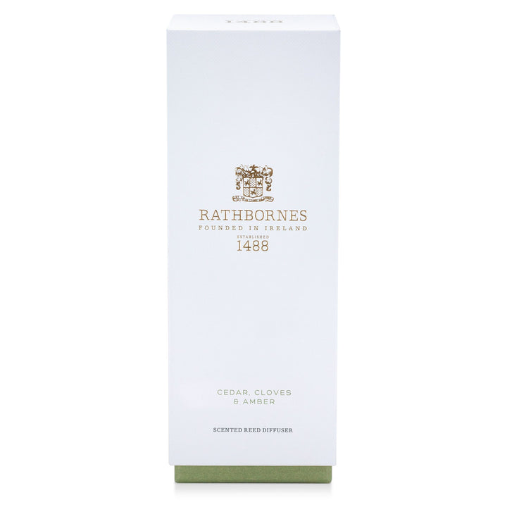 White gift box with green base for the Rathbornes Cedar, Cloves & Amber scented reed diffuser