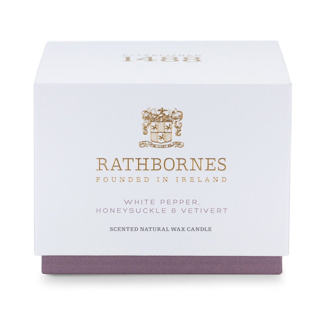 White gift box with mauve base for the Rathbornes White Pepper, Honeysuckle & Vetivert classic scented candle