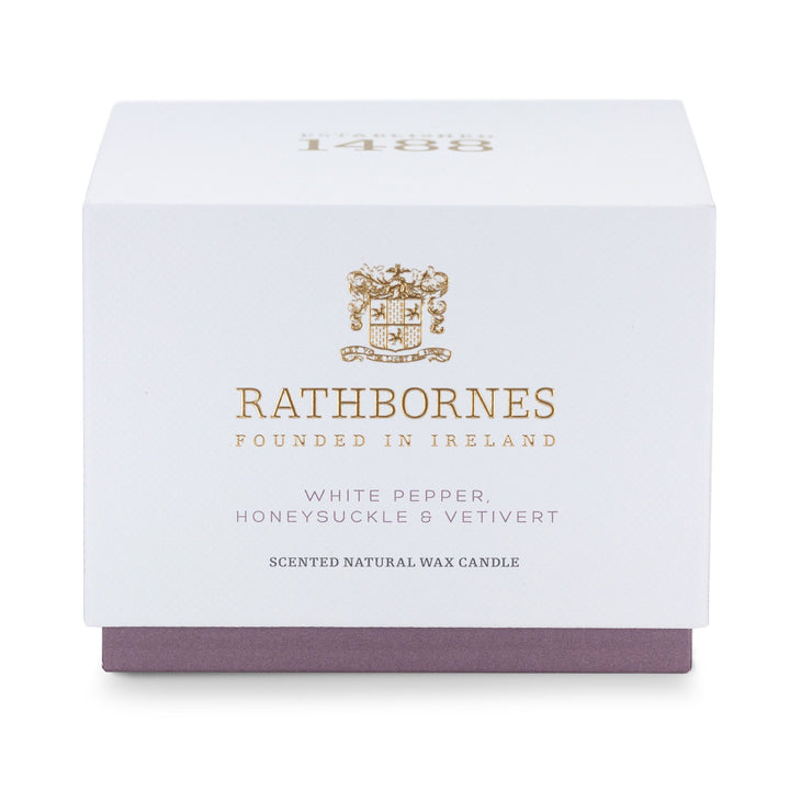 White gift box with mauve base for the Rathbornes White Pepper, Honeysuckle & Vetivert classic scented candle