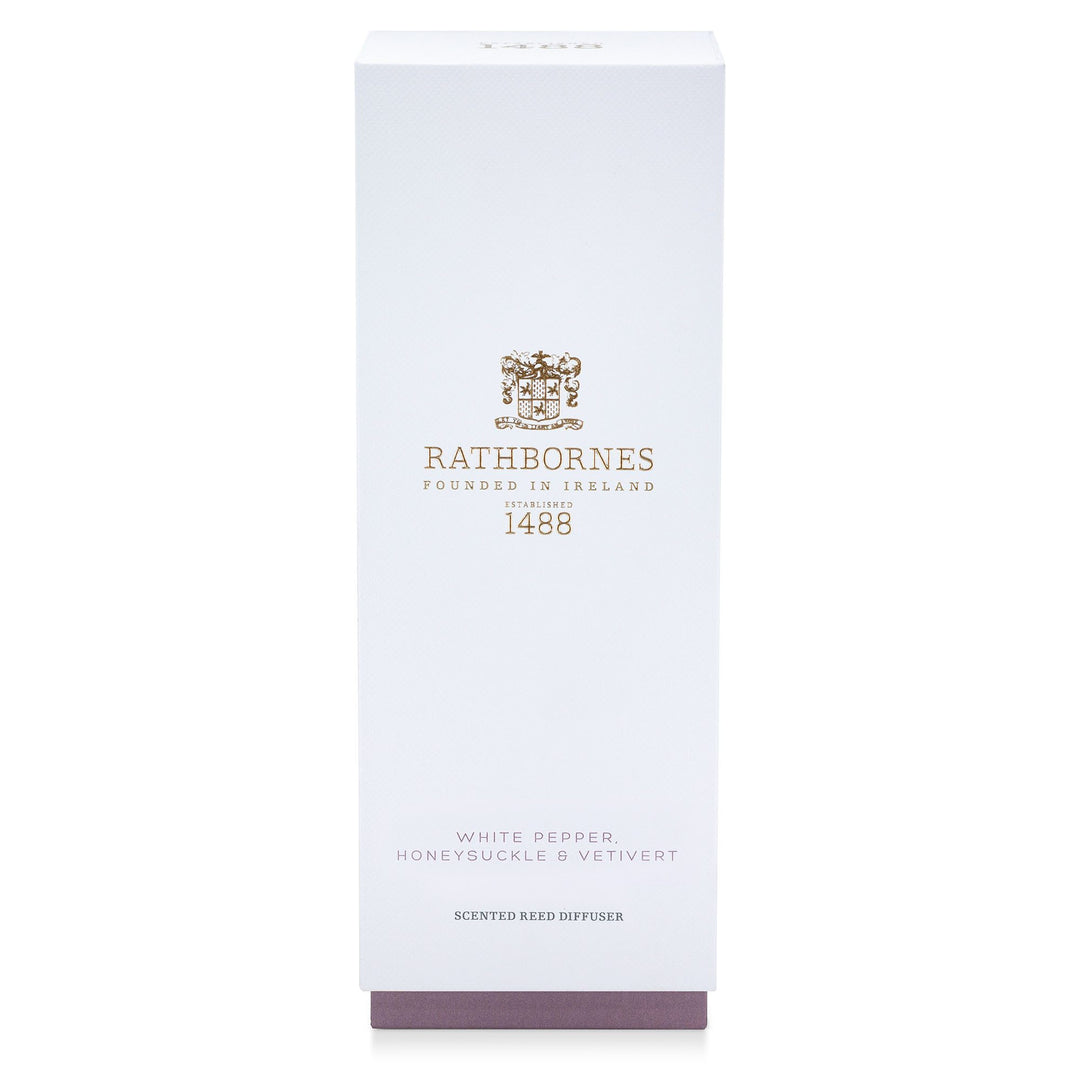 White gift box with mauve base for the Rathbornes White Pepper, Honeysuckle & Vetivert scented reed diffuser