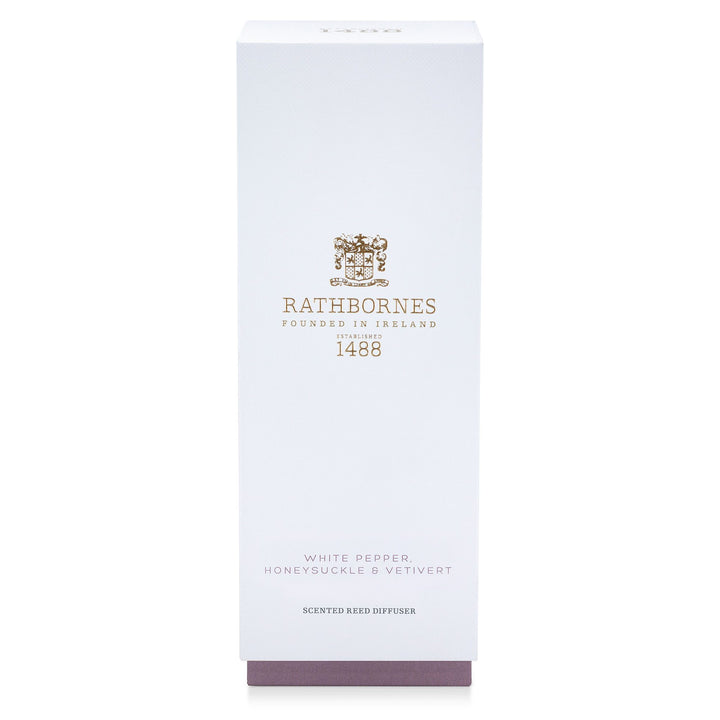 White gift box with mauve base for the Rathbornes White Pepper, Honeysuckle & Vetivert scented reed diffuser