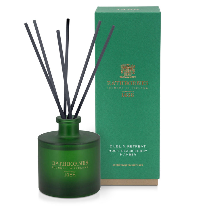 Rathbornes Dublin Retreat (Musk, Black Ebony & Amber) scented reed diffuser with reeds, beside its gift box