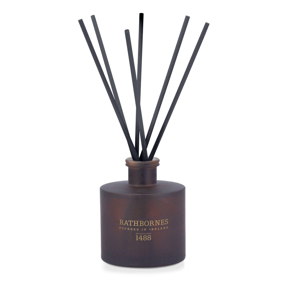 Rathbornes Seanchaí Dún 200ml scented reed diffuser in plum glass with black reeds