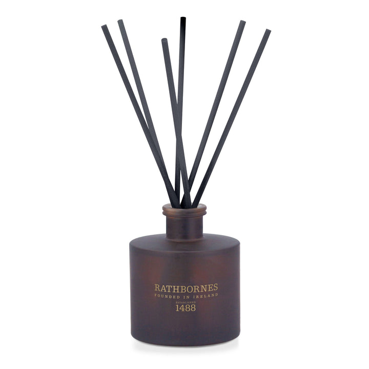 Rathbornes Seanchaí Dún 200ml scented reed diffuser in plum glass with black reeds